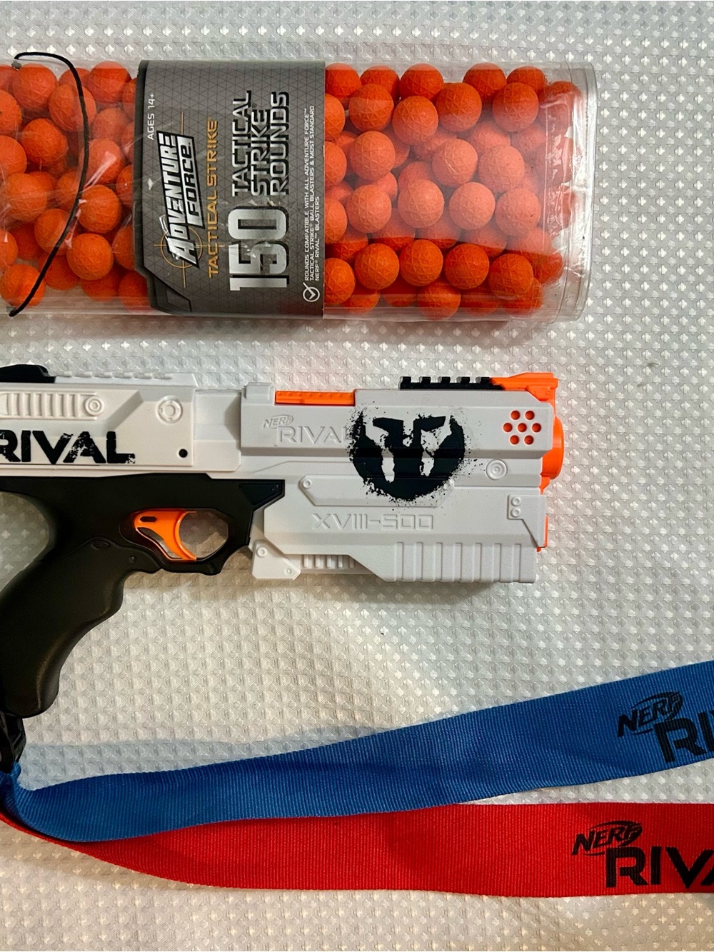 Nerf Rival White Foam Blaster and Red/Blue Straps plus extra rounds